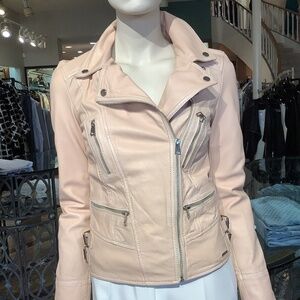 Fabulous lamb leather in soft ecru peach. Bit distressed. Tons of detail ,fun